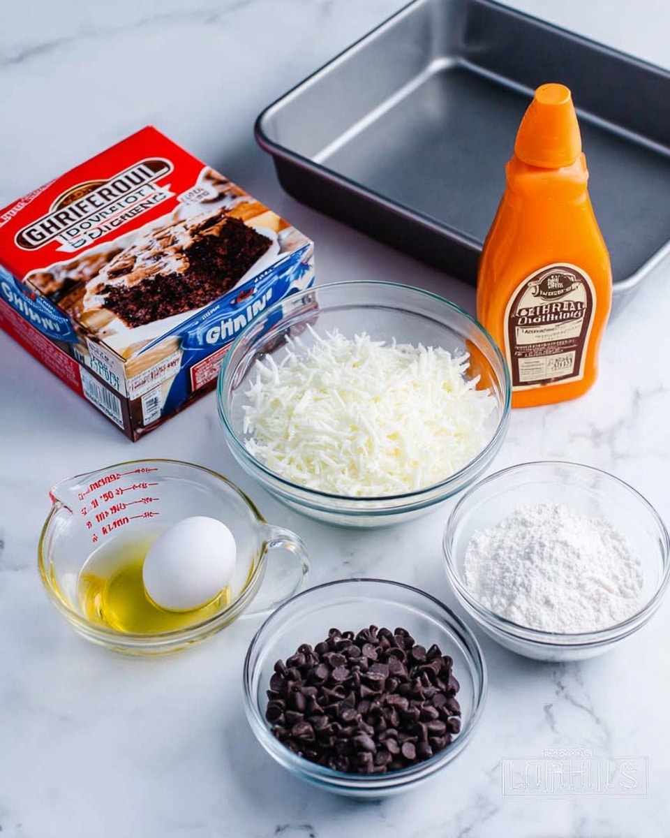 The image shows a simple baking setup on a white marbled surface with a variety of ingredients arranged neatly. In the back left, there is a box of Ghirardelli Double Chocolate Brownie Mix with red and blue packaging. In front of it, a clear glass bowl holds a white shredded ingredient. To the right, an orange bottle of Ghirardelli caramel sauce stands next to a clear measuring cup filled with a light yellow liquid, likely oil. In front, a single white egg sits next to a small clear bowl filled with dark chocolate chips. On the far right, another clear measuring cup holds a white powdery ingredient, possibly flour. Behind all these ingredients is a clean metal baking pan. The photo taken with an iphone --ar 4:5 --v 7