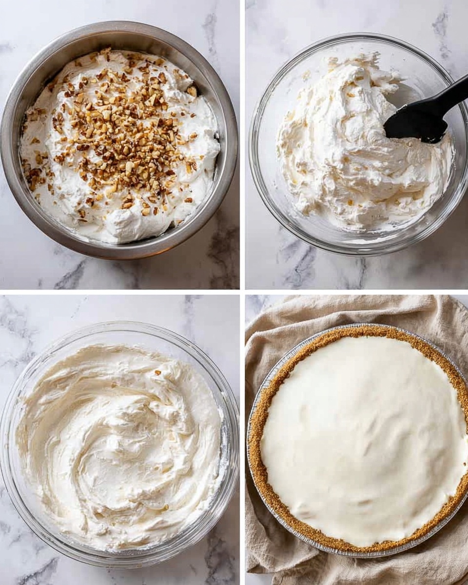 The image shows a four-step process of making a dessert. The first frame presents a metal bowl with a fluffy white whipped mixture topped with crushed nuts of brown and golden colors, with a black spatula resting inside. In the second frame, the same metal bowl contains the whipped mixture with a slightly thicker texture and small nut pieces mixed in, the black spatula lifting the mixture. The third frame reveals a clear glass bowl filled with the smooth, creamy white mixture spread evenly with a slightly textured surface. Lastly, a deep white glass pie dish holds a dessert base covered with a thick, evenly spread layer of creamy white mixture, placed on a beige fabric on a white marbled surface. Photo taken with an iphone --ar 4:5 --v 7