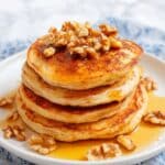 Pumpkin Spice Pancakes with Maple Syrup and Whipped Cream Recipe