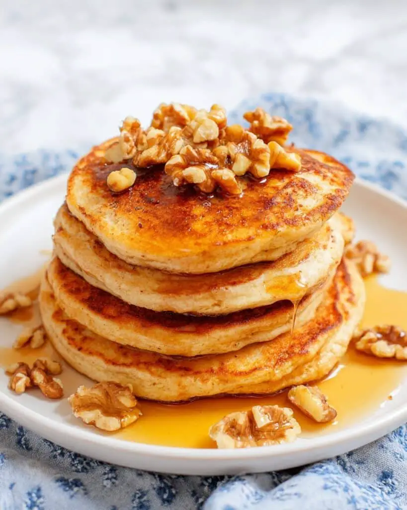 Pumpkin Spice Pancakes with Maple Syrup and Whipped Cream Recipe