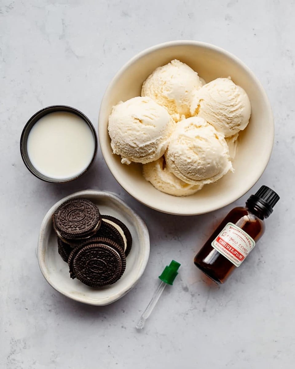 A white bowl filled with several scoops of off-white creamy ice cream is placed on a white marbled surface. Below it, there is a small white bowl holding a few dark chocolate sandwich cookies with cream inside. To the left, there is a small black bowl filled with white liquid that looks like milk or cream. Between the bowls of cookies and ice cream, there is a small brown glass bottle with a white and red label and a black cap, along with a tiny green pipette or dropper next to it. Photo taken with an iphone --ar 4:5 --v 7