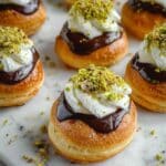 Decadent Pistachio Cream Puffs with Chocolate Glaze Recipe