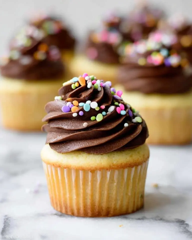 Yellow Birthday Cupcakes with Chocolate Buttercream and Sprinkles Recipe