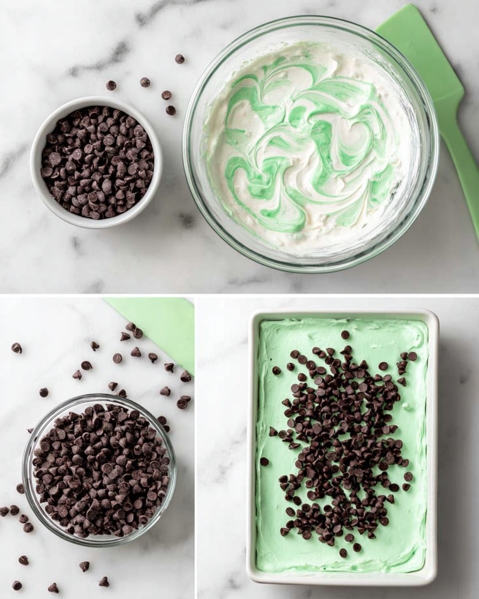 The image shows three steps of making a mint chocolate dessert. In the first step, a large clear glass bowl on a white marbled surface holds white creamy mixture with green swirls in the center. Around the bowl are dark chocolate chips in a white bowl and scattered on the surface, with a green spatula resting nearby. In the second step, the same clear glass bowl now contains a smooth light green creamy layer topped with a pile of dark chocolate chips. The background and surrounding items stay the same. In the third step, the light green creamy mixture with dark chocolate chips spread evenly on top fills a white rectangular tray placed on the same white marbled surface, with some chocolate chips scattered around it. Photo taken with an iphone --ar 4:5 --v 7