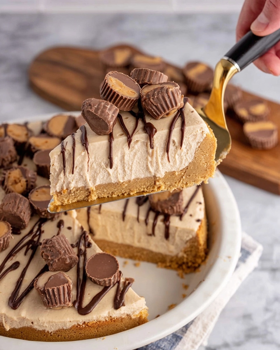 A slice of peanut butter cheesecake is lifted by a woman's hand holding a golden pie server with a black handle. The cheesecake has three layers: a light golden crumbly crust at the bottom, a thick creamy beige peanut butter filling in the middle, and a smooth layer of the same filling on top. Drizzled over the top are dark chocolate lines, adding rich contrast. Scattered on the top layer are halved and whole miniature peanut butter cups, showing their chocolate shell and peanut butter center. The cheesecake sits in a white pie pan on a white marbled surface, with a wooden board of extra peanut butter cups in the background. Photo taken with an iphone --ar 4:5 --v 7