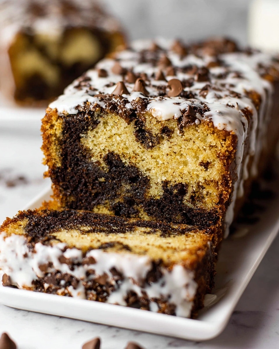 The image shows two thick slices of a marbled chocolate chip loaf stacked on a white rectangular plate with a few chocolate chips scattered on the side. Each slice has two layers: a golden-brown cake layer swirled with dark chocolate chunks on top, and a moist, dark chocolate chip layer with white icing dripping down the sides at the bottom. The texture of the cake layer is rough and crumbly, while the chocolate chip layer looks dense and rich with glossy chocolate chips. The background and surface are white marbled, giving a clean and bright look. Photo taken with an iphone --ar 4:5 --v 7