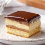Boston Cream Poke Cake with Pastry Cream, Diplomat Frosting, and Chocolate Ganache Recipe