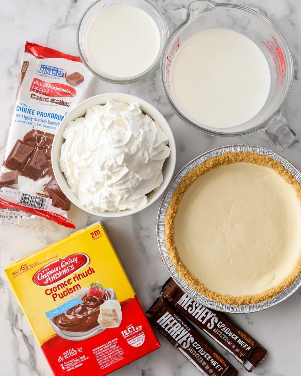 The image shows ingredients for a chocolate pie arranged on a white marbled surface. There is one clear measuring cup filled with white milk on the left and another clear measuring cup filled with cream or a similar white liquid on the top right. In the bottom left, a white bowl holds fluffy white whipped cream. Next to the whipped cream, slightly overlapping, is a yellow and red box of chocolate instant pudding mix with a picture of a brown pudding topped with a spoonful of pudding. At the bottom right is a pre-made graham pie crust in a foil pan with a red label featuring strawberries and nutrition facts. In the top right corner, there are four sticks of Hershey's milk chocolate. Photo taken with an iphone --ar 4:5 --v 7