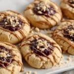PB&J Cookies with Peanut Butter Drizzle and Chopped Peanuts Recipe
