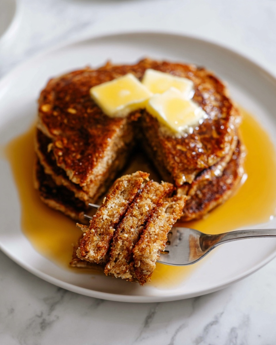 A white round plate holds two pieces of thick, golden-brown toast stacked slightly on top of each other, each covered in a crunchy cereal coating. Each toast slice has a small dollop of melting butter near the center, with syrup being poured over the butter on the slice in front, creating a shiny, wet texture that glistens. The toast's surface looks crispy and textured with small cereal bits. The plate sits on a white marbled surface with a silver fork and knife nearby. Partially visible in the top corners are a blue bowl filled with bright red strawberries on the left and a white plate with more cereal-coated toast on the right. Photo taken with an iphone --ar 4:5 --v 7