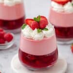 Creamy Raspberry Mousse with Raspberry Compote and Fresh Herb Garnish Recipe