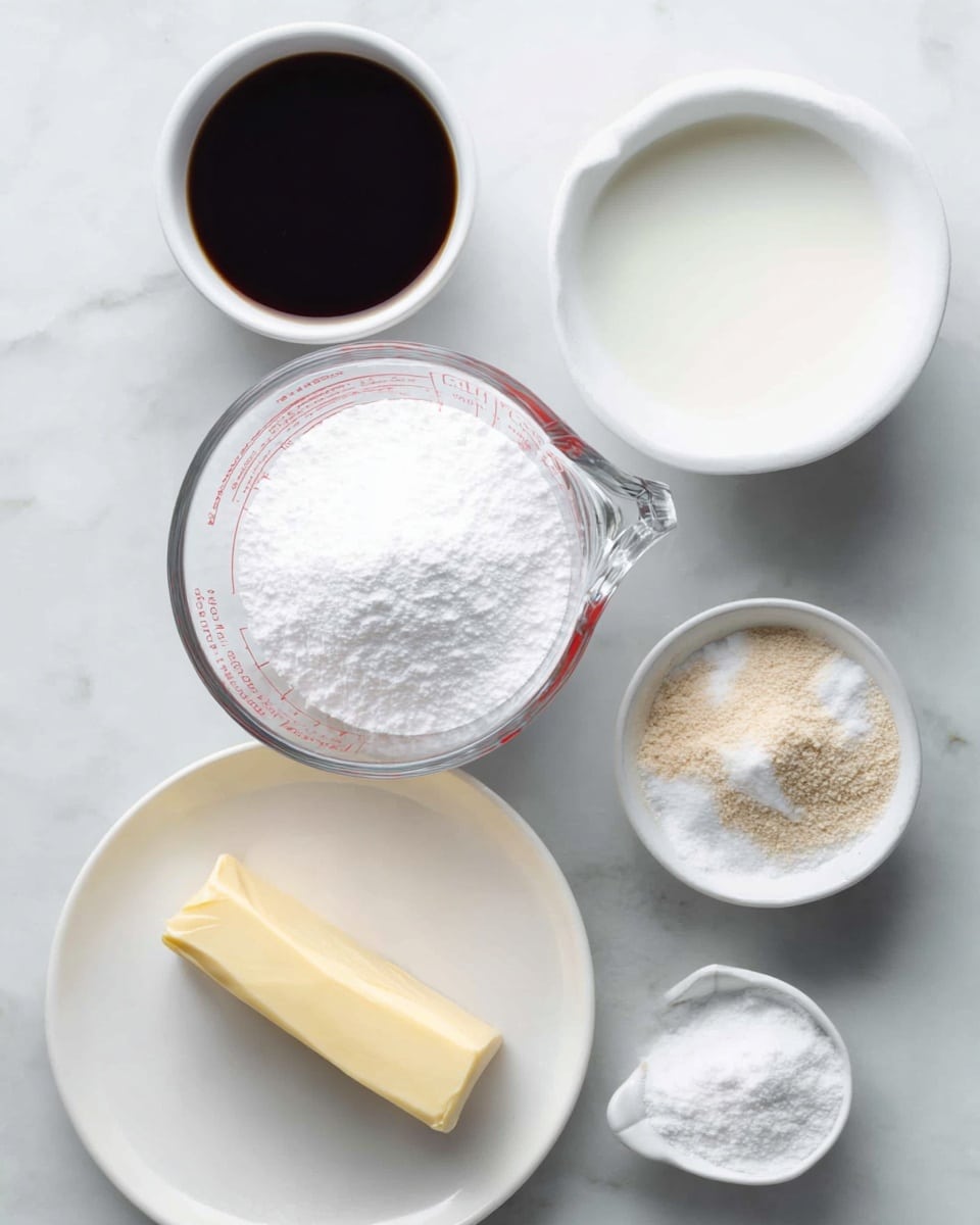 The image shows five small containers of ingredients placed on a white marbled surface. In the center is a clear measuring cup filled to the top with white powdered sugar. Surrounding it are four white bowls: one with a dark brown liquid, another with white milk, one with a yellow stick of butter on a white plate, and a small bowl with a mixture of light brown and white powders. The setup is simple and clean, with soft lighting highlighting the different textures of the ingredients. Photo taken with an iphone --ar 4:5 --v 7