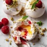 Pavlova Bombs with Raspberry Coulis, Lemon Curd, and Whipped Cream Recipe