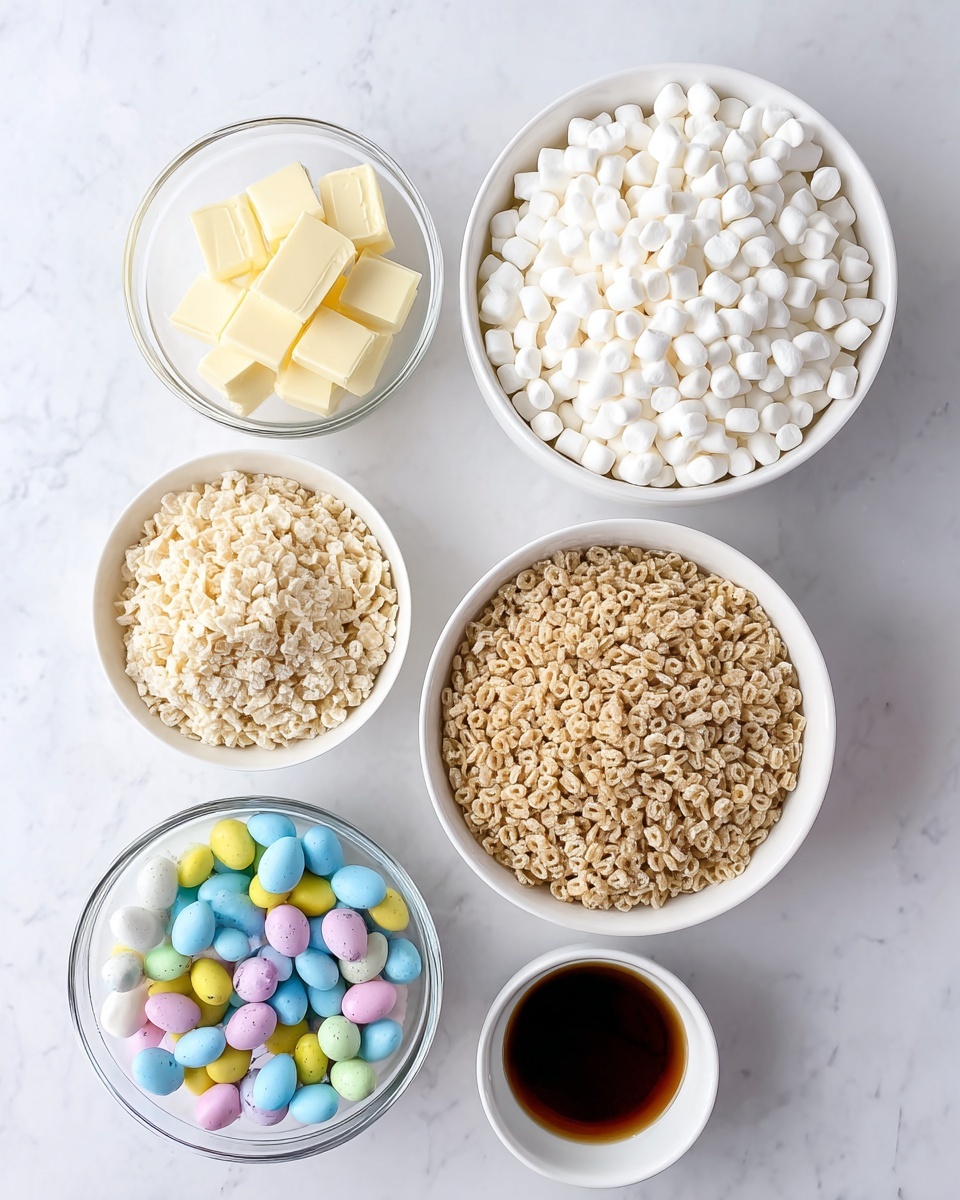 The image shows five clear and white bowls placed on a white marbled surface, each filled with different ingredients. The largest white bowl at the top right is filled with tiny white marshmallows, closely packed together. Below, a smaller white bowl holds light beige crispy rice cereal with a rough texture. To the left, a small clear bowl contains square chunks of light yellow butter. Below the cereal bowl, there is a clear bowl filled with colorful candy-coated chocolate eggs, some whole and some cracked showing milk chocolate inside, in pastel colors like blue, yellow, pink, and white. Finally, there is a very small white bowl at the bottom right containing dark brown vanilla extract. All bowls are neat and clean, with soft natural lighting highlighting the textures and colors. Photo taken with an iphone --ar 4:5 --v 7