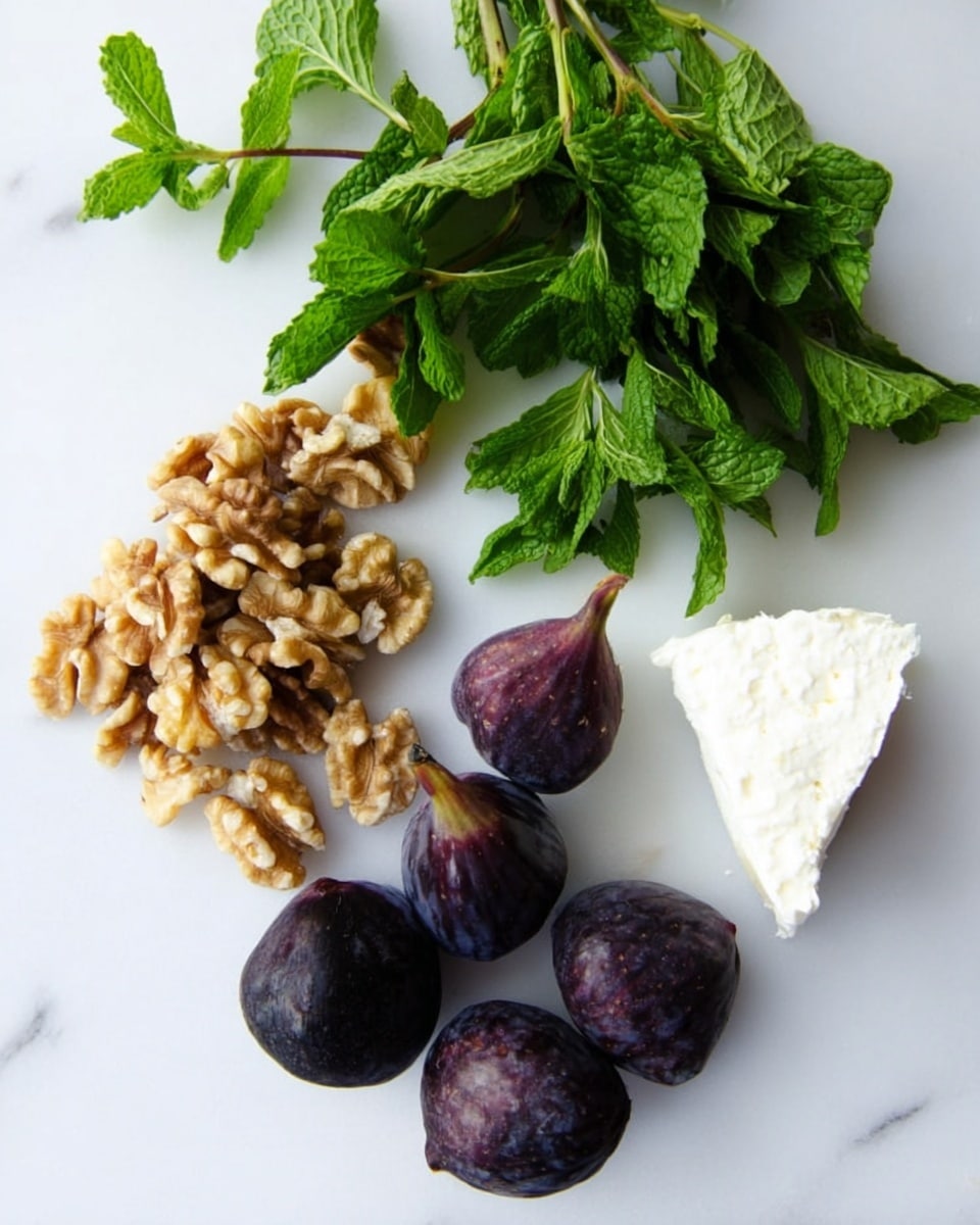 The image shows ingredients on a white marbled surface: a bunch of fresh green mint leaves on the top left, a heap of light brown walnuts below the mint, a pile of dark purple figs grouped together on the right, and a block of white cheese on the top right. The colors stand out clearly with the white marbled surface as the background. Photo taken with an iphone --ar 4:5 --v 7