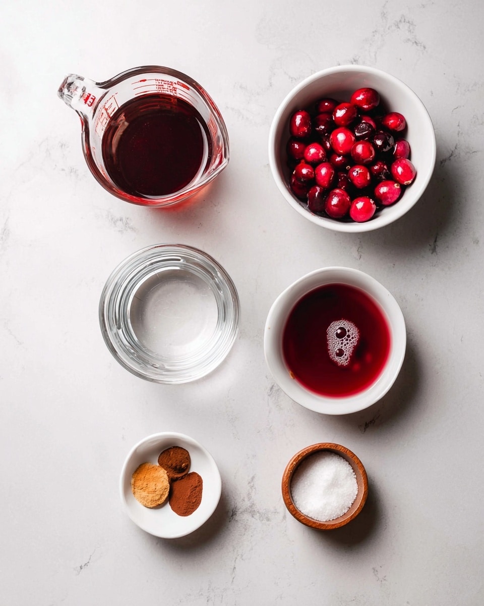 The image shows six containers with different ingredients on a white marbled surface. On the top left, there is a clear glass measuring cup filled with a dark reddish liquid. To the right, there is a white bowl filled with halved red cranberries. Below the glass cup, there is another clear measuring cup with water. To the right of the water, there is a small white bowl with a deep red liquid and a small bubble on its surface. Below these, on the left, is a small white bowl holding two types of brown powdered spices. To the right of the spices, there is a small round wooden bowl filled with white granulated salt. The ingredients are spaced evenly and presented neatly. photo taken with an iphone --ar 4:5 --v 7