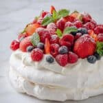 Classic Pavlova Cake with Fresh Berries and Whipped Cream Recipe
