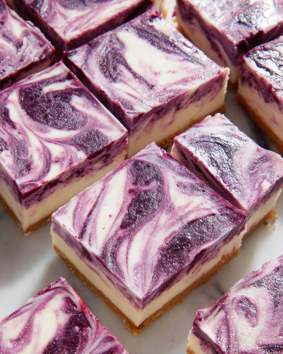The image shows six square pieces of a dessert arranged closely on a white marbled surface. Each piece has two layers: a light cream-colored base layer and a top layer with swirled deep purple and light pink patterns creating a marbled effect. The swirls are smooth and glossy, covering the entire top surface of each square, giving a rich, creamy texture look. The squares are cleanly separated by visible cuts, highlighting the thickness of the base and top layers. photo taken with an iphone --ar 4:5 --v 7