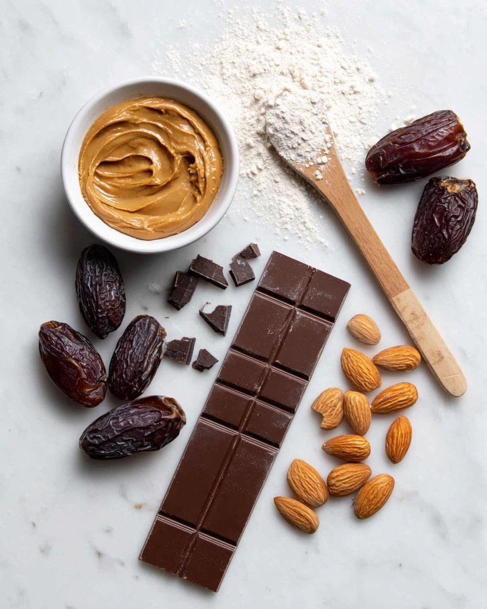 The image shows several ingredients neatly arranged on a white marbled surface. There is a small white bowl filled with smooth, creamy peanut butter, and beside it is a wooden spoon with some white powder on it. Around the bowl and spoon, there are shiny, dark brown dates scattered, some whole and some open. Below the dates, smooth dark chocolate pieces are laid out in a rectangular bar and small broken chunks. Near the chocolate, there is a neat group of whole almonds showing their light brown skins. The composition is clean and simple with a bright natural light. Photo taken with an iphone --ar 4:5 --v 7
