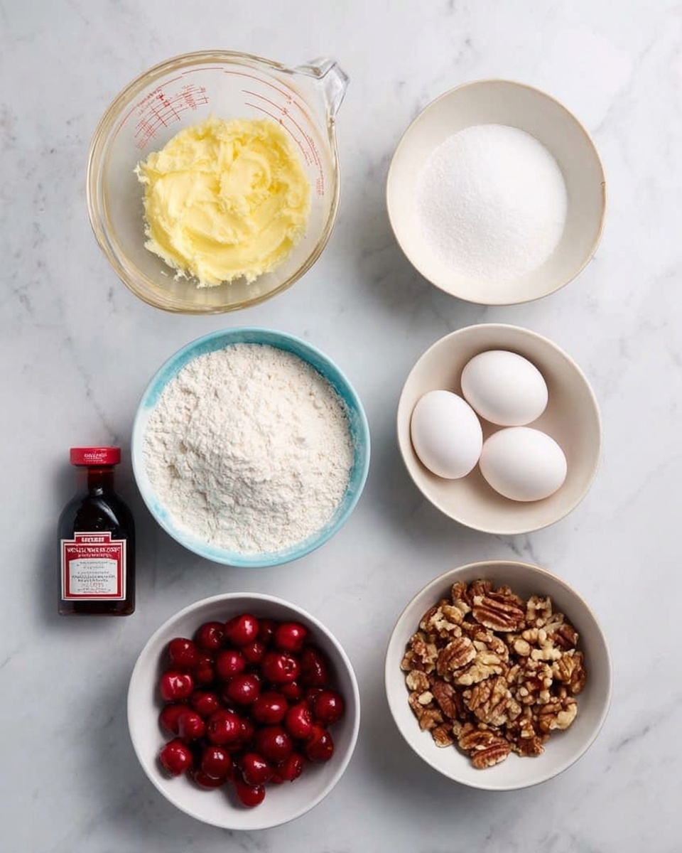 The image shows seven bowls and a small bottle arranged on a white marbled surface. The top left bowl is a clear measuring cup with softened yellow butter. Next to it on the right is a white bowl filled with fine white sugar. To its right, there is a white bowl holding three white eggs. Below the sugar is a white bowl with white flour, which has a blue rim. Below the eggs is a clear bowl filled with bright red fresh cherries. To the far right is a white bowl containing chopped nuts that are brown in color. At the bottom left of the image is a small bottle of vanilla extract, dark brown with a red and white label. Photo taken with an iphone --ar 4:5 --v 7