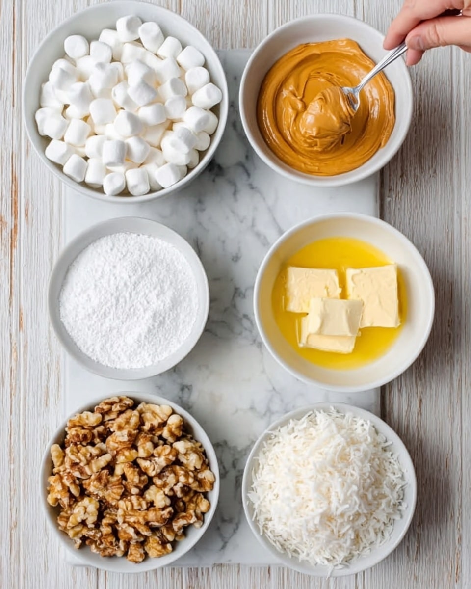 The image shows six white bowls filled with different ingredients arranged on a white marbled surface. Starting from the top left, there is a bowl full of small white marshmallows with a smooth texture. To the right, a bowl holds smooth, orange peanut butter. Below that, a bowl contains melted yellow butter with a shiny surface. At the bottom right, a bowl is filled with white shredded coconut flakes that look dry and fluffy. Next to that, at the bottom left, there is a bowl with chopped walnuts in shades of brown with a rough texture. Finally, in the middle left, a bowl holds a white powdery substance that looks like powdered sugar. A woman's hand holds a spoon with a small scoop of peanut butter above the bowls. Photo taken with an iphone --ar 4:5 --v 7