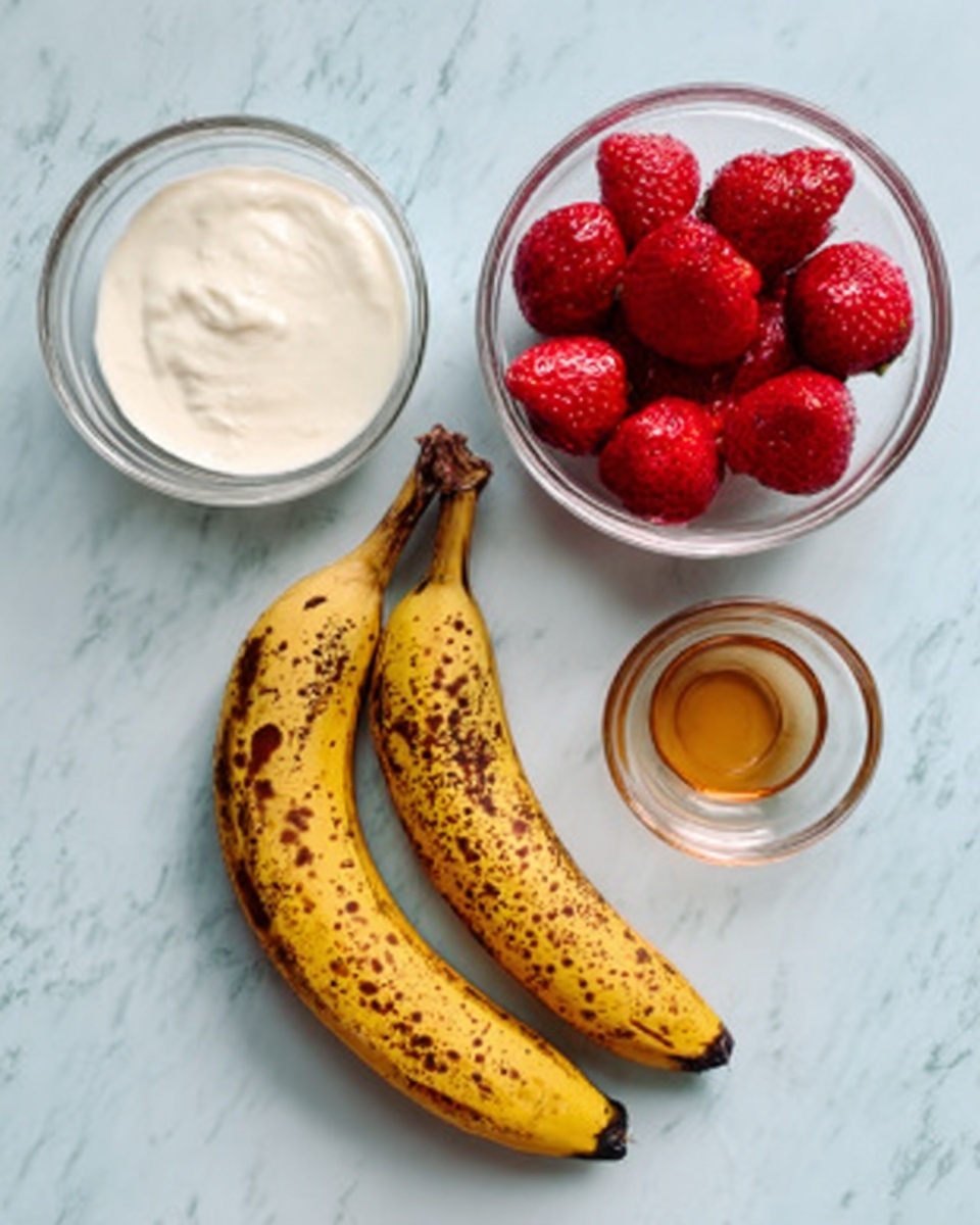 The image shows two ripe bananas with brown spots placed side by side on a white marbled surface. Above the bananas, there is a small clear glass bowl filled with bright red strawberries. To the left of the strawberries, there is a small clear glass bowl filled with a thick white creamy substance. To the right of the strawberries, there is a small clear glass bowl with a light brown liquid, likely syrup or honey. The setup is neat and simple with the fruits and bowls arranged in a loose triangular shape. photo taken with an iphone --ar 4:5 --v 7