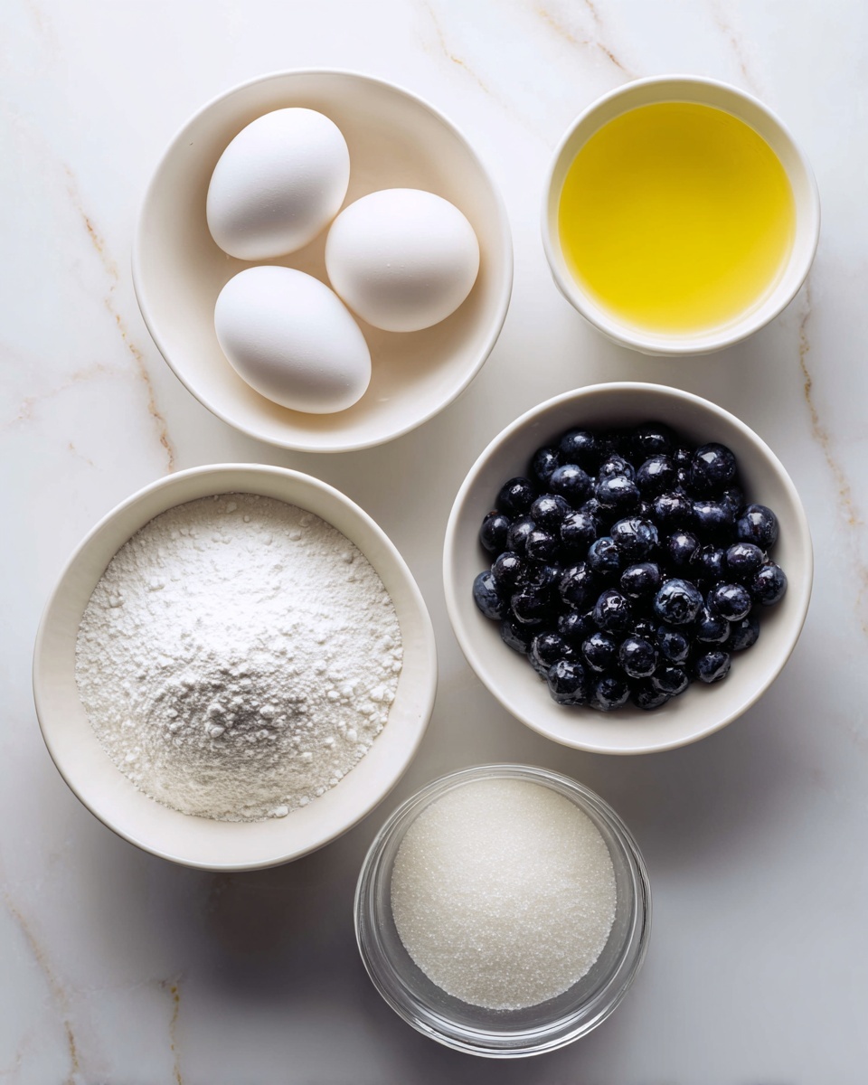 The image shows five white bowls and a glass jug arranged on a white marbled surface. One bowl holds five white eggs, another contains a heap of white powdered sugar with a smooth, fine texture, and a third bowl is full of small, dark blueberries. There is a bowl with a yellow liquid that looks like melted butter or oil, and another bowl filled with white granulated sugar. The glass jug is empty and clear, placed at the front right. The items are neatly spaced, creating a clean and organized look. photo taken with an iphone --ar 4:5 --v 7