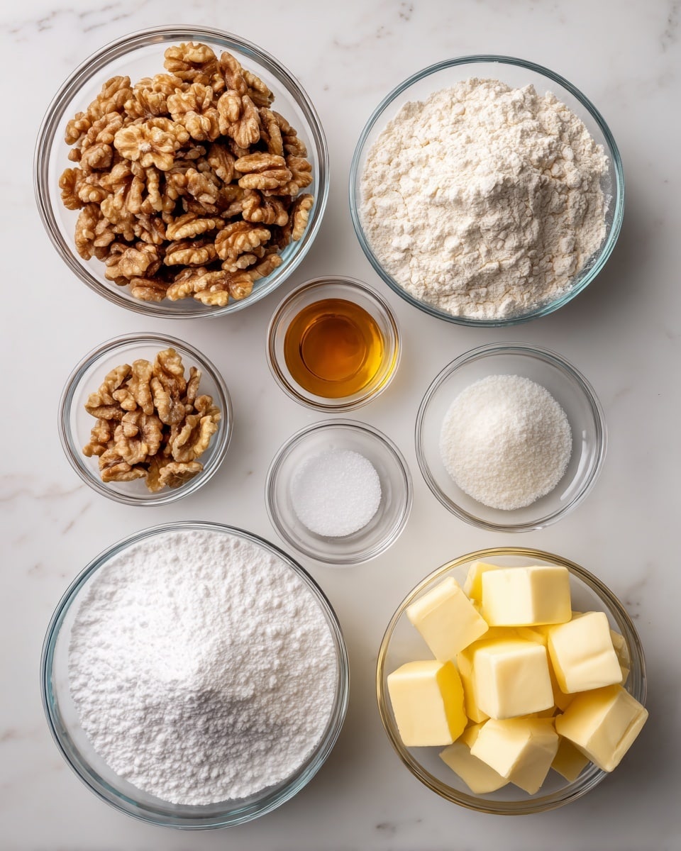 This image shows seven round, clear glass bowls with different baking ingredients arranged on a white marbled surface. The largest bowl on the top left is full of large, light brown walnuts with rough textures. To its right, a similarly sized bowl holds fine white flour with a powdery texture. Below the walnuts, a large bowl is filled with fluffy, white powdered sugar. Between the powdered sugar and flour bowls are three smaller bowls arranged vertically: the top one has coarse salt with visible granules, the middle one contains a small amount of golden brown vanilla extract, and the bottom one has fine white granulated sugar. On the right side of the image, beside the flour and smaller bowls, is a medium-sized bowl filled with pale yellow butter cubes showing smooth but firm surfaces. The whole set is neatly arranged and evenly lit. Photo taken with an iphone --ar 4:5 --v 7