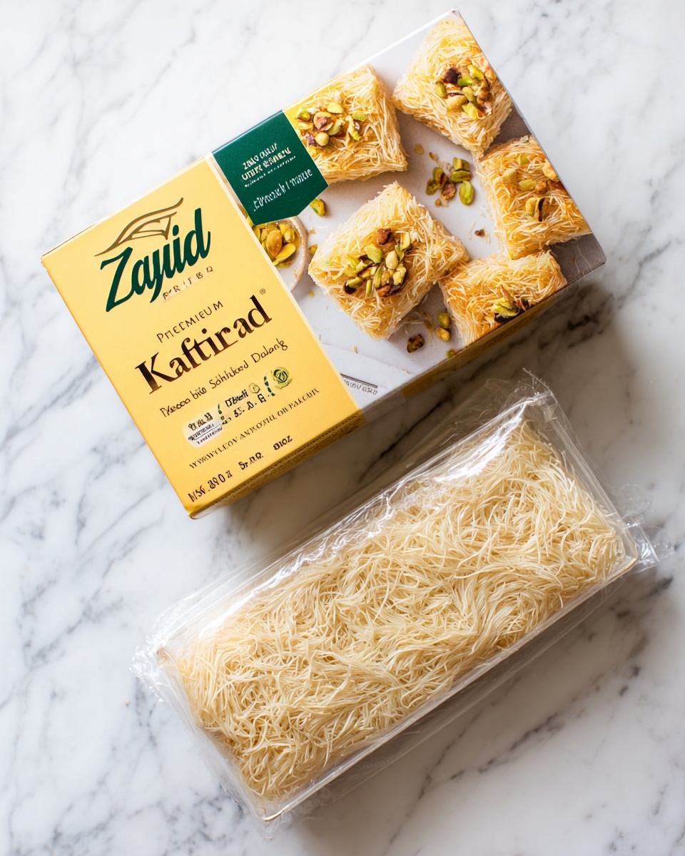 The image shows a packaged food item on a white marbled surface. The package displays a yellow and green box labeled
