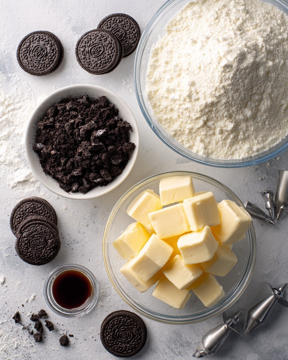A top view of baking ingredients arranged on a white marbled surface, showing a large bowl filled with fine white powdered sugar with a slightly rough texture at the top right. Below it, a clear glass bowl contains many pale yellow butter cubes with smooth, clean edges. To the left, a smaller white bowl holds finely crushed dark chocolate Oreo cookies with a crumbly texture. Around these bowls, there are several whole Oreo cookies in their blue original wrappers, along with three unwrapped Oreo cookies placed on the surface. Nearby, there is a small glass cup filled with dark brown vanilla extract. Metal piping tips are scattered around, catching the light with their shiny silver surfaces. photo taken with an iphone --ar 4:5 --v 7