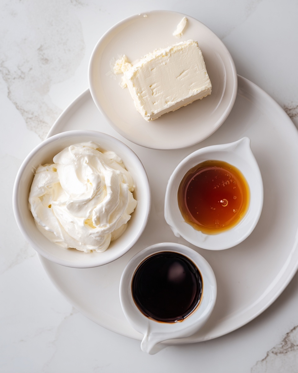 A top view shows four ingredients for a healthy cheesecake dip arranged on a white marbled surface. At the top right is a white round plate holding a block of smooth, pale cream cheese with a soft texture and few air bubbles. Below it, slightly to the left, is a white bowl filled with thick, creamy Greek yogurt, showing soft peaks and a rich texture. To the right of the yogurt is a small white bowl with a dark brown liquid maple syrup that has a glossy, smooth surface. Below these bowls is a tiny white dish with a small amount of dark vanilla extract, smooth and shiny. Each item is labeled with a simple white tag and black text above or beside it. Photo taken with an iphone --ar 4:5 --v 7
