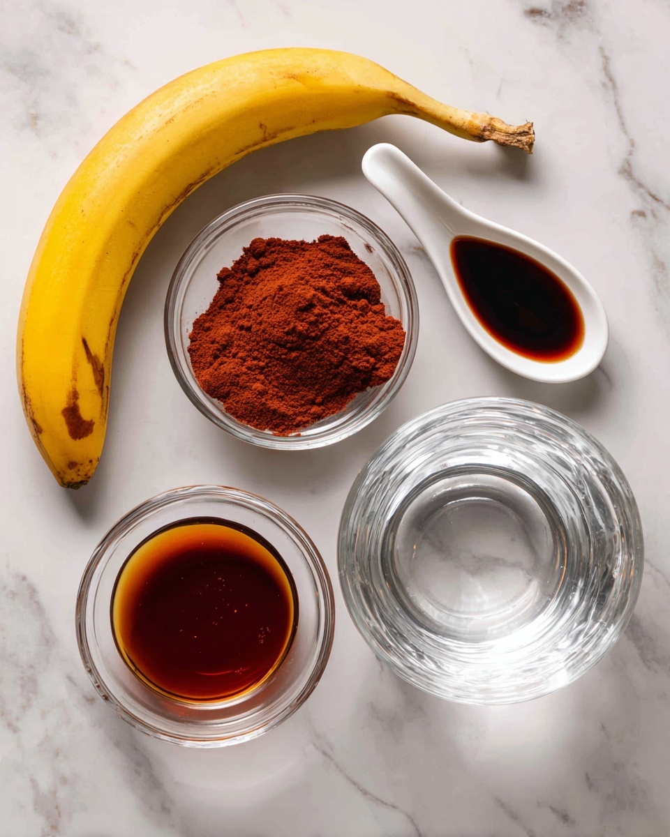 A white marble surface holds three clear glass bowls and a white spoon with a dark liquid. The largest bowl at the bottom right is filled with water. Above it to the left, a smaller bowl contains a thick reddish-brown powder. To the left below the powder bowl, there is another bowl filled with a dark amber liquid. A white spoon with dark soy-colored sauce sits on the top right. A ripe yellow banana with a few brown spots lies on the left side of the bowls. photo taken with an iphone --ar 4:5 --v 7