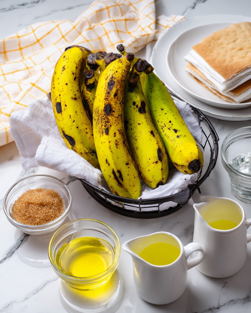 A group of five ripe plantains with green and black spotted yellow skins sit in a black wire basket lined with white cloth, next to a white plate stacked with several thin, square white sheets of dough. Nearby are three clear glass bowls, one holding light brown sugar crystals, one with two bright yellow jarred peppers, and one empty. In front of the plate are two small white pitchers, one filled with a clear liquid and the other with bright yellow oil. The items rest on a white marbled surface with a white and yellow checkered cloth partially visible in the background photo taken with an iphone --ar 4:5 --v 7