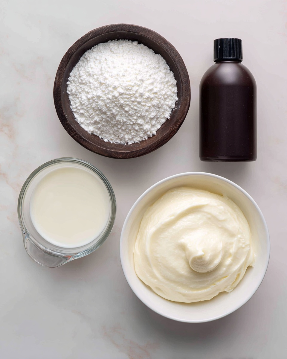 The image shows a dark gray bowl filled with white powdered sugar in the center on a white marbled surface. To the upper left of the bowl, there is a brown bottle lying down. To the right of the bowl, there is a round white container filled with smooth, creamy white frosting that has a slight dip in it. Below the container, a clear glass measuring cup holds a white liquid, likely cream. The setting is clean with a white marbled background. photo taken with an iphone --ar 4:5 --v 7