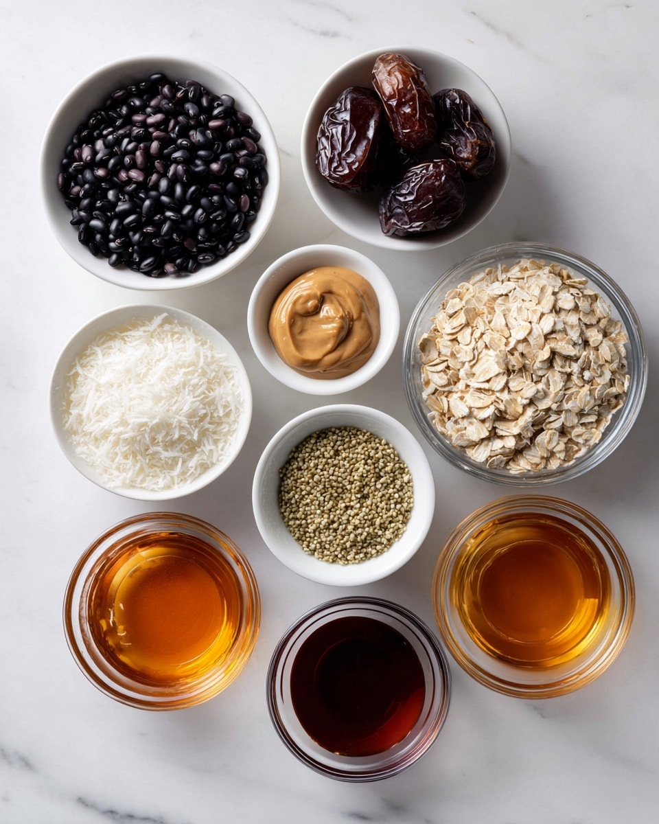 The image shows seven small white bowls and two clear glass bowls arranged on a white marbled surface. The bowls contain different ingredients: shiny black beans filling one bowl fully on the top left, a light brown creamy peanut butter in a small bowl to the upper right, a bowl with dark brown dates in the center, a clear bowl with pale beige oats to the right, a clear bowl with pale green hemp seeds to the left, a white bowl filled with white shredded coconut at the bottom left, and two small clear bowls with amber and dark amber liquids at the lower right. The colors contrast nicely with the white marble surface photo taken with an iphone --ar 4:5 --v 7