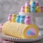 Easter Cake Roll with Colorful Buttercream and Marshmallow Peeps Recipe